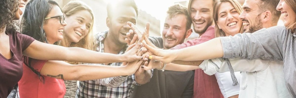 people stacking hands